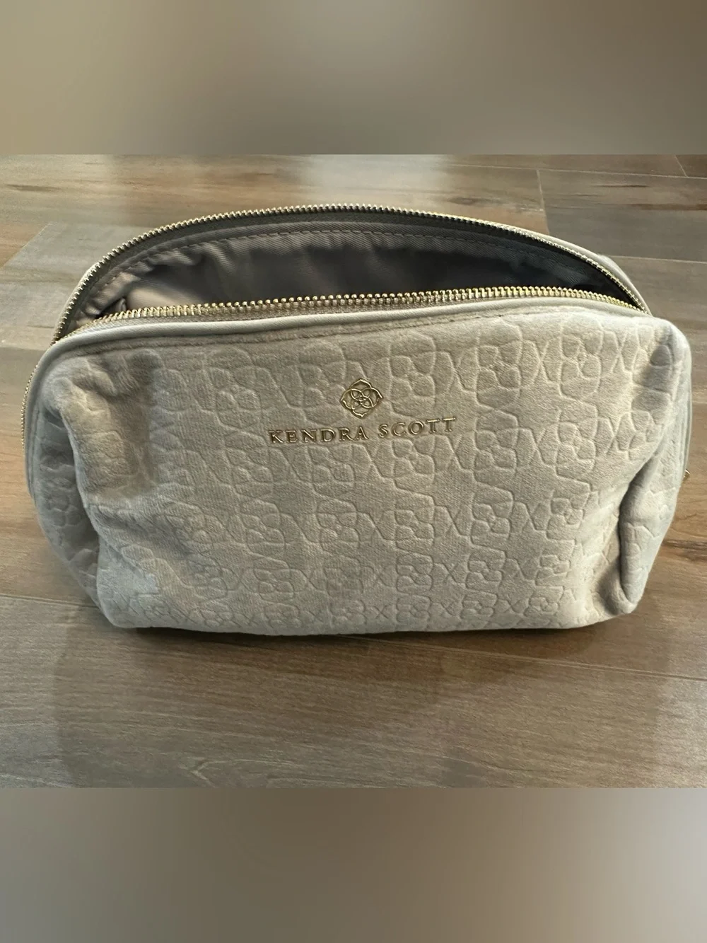 Kendra Scott Light Gray Logo Embossed Pouch with Gold Accent